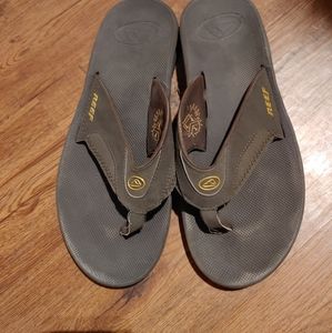 Dark brown flip flops